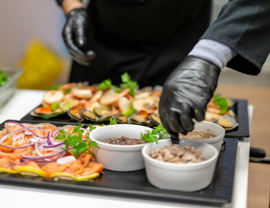 MAN PREPARING FOOD